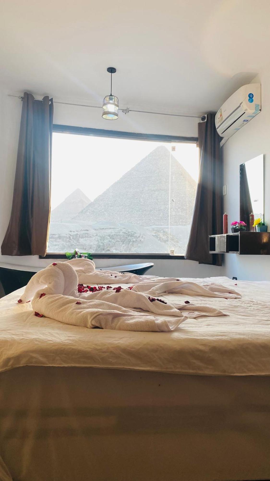 Alba Pyramids View Il Cairo Esterno foto